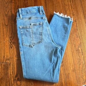 Good American skinny cropped jeans.